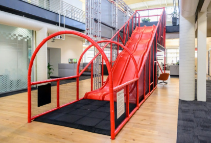 A slide that employees use to zip down to the first a floor inside YouTube's headquarters in San Bruno, California, harkens back to playful early days at the online video sharing platform now challenging traditional television A slide that employees use to zip down to the first a floor inside YouTube's headquarters in San Bruno, California, harkens back to playful early days at the online video sharing platform now challenging traditional television