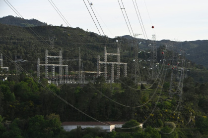 High-voltage pylons carry electricity from Spain to Portugal - MIGUEL RIOPA High-voltage pylons carry electricity from Spain to Portugal - MIGUEL RIOPA