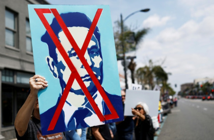 Protesters demonstrate against Tesla CEO Elon Musk's Department of Government Efficiency (DOGE) initiatives in March 2025 in Pasadena, California - MARIO TAMA (AFP) Protesters demonstrate against Tesla CEO Elon Musk's Department of Government Efficiency (DOGE) initiatives in March 2025 in Pasadena, California - MARIO TAMA (AFP)